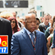 Rep. John Lewis (center) marches with March co-authors Andrew Aydin (left) and Nate Powell (right). All Photos by Al Powers/Invision/AP